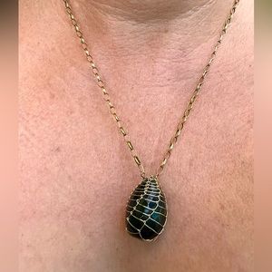 Gorgeous, one of a kind large caged onyx set in gold plating